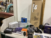 BOX OF RANDOM MISC ITEMS - CELLPHONE PURSE, WEBCAM, TRELLIS KT, GAMING HEADSET, OUTLET MOUNT FOR WIFI SYSTEM - 3