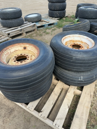 Four implement tires on rims