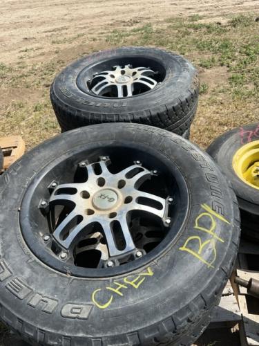 Four Bridgestone tires on GFX aluminum rims