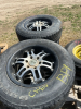 Four Bridgestone tires on GFX aluminum rims