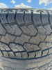 4 Truck tires on Dodge aluminum rims - 4