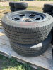 Three Goodyear car tires on five bolt Ford steel rims - 4