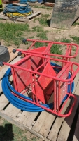 Coil of 3/4-in hex pipe plus two shop trolleys