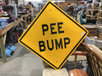 “PEE BUMP” SIGN