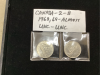 2 - CANADA ONE DOLLAR COINS - 1968 + 1969