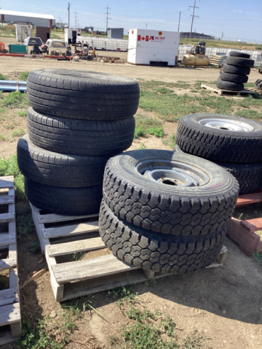 PALLET WITH 15” TIRES - SOME ON RIMS