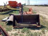 UNIVERSAL FRONT END LOADER WITH BUCKET AND A BLADE