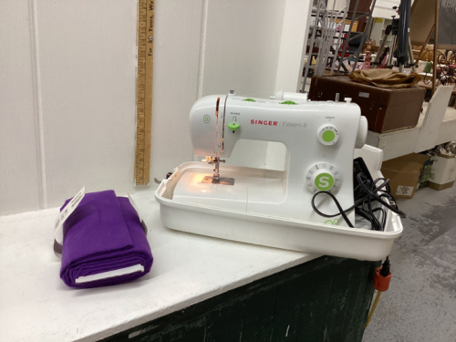 SINGER SEWING MACHINE WITH SMALL BOLT PURPLE FLANNEL FABRIC