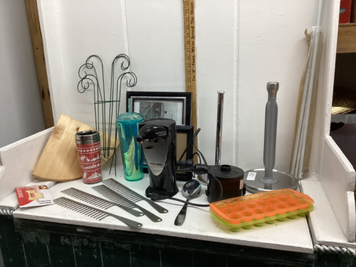 BOX OF HOUSEHOLD ITEMS - PAPER TOWEL. HOLDERS, PICTURES, SMALL TENSION RODS, SMALL CORNER SHELF