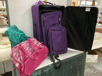 PURPLE SUITCASE W/CARRY ON AND 2 DUFFLE BAGS