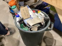 GARBAGE CAN WITH ASSORTED LAWN CARE PRODUCTS