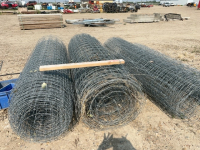 Four partial rolls of 8 foot tall page wire