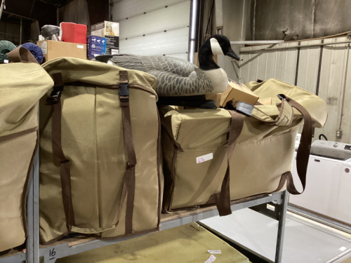 SHELF 16: CANADA GOOSE DECOYS IN GOOD CARRYING BAGS W/ (2) BOXES ANCHORS