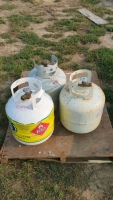 Three propane cylinders