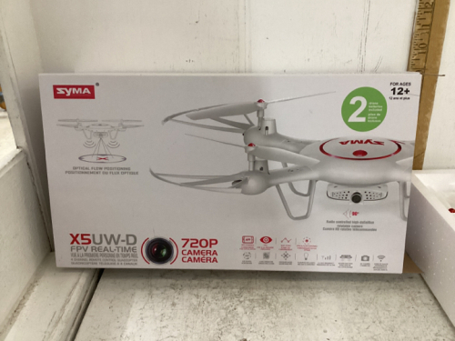 SYMA QUAD COPTER DRONE - HAS CAMERA