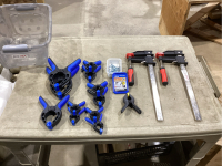 TUB WITH ASSORTED CLAMPS AND CONTAINER OF 2” SCREWS