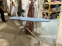 IRONING BOARD WITH ATTACHED EXTENSION CORD