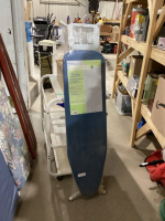 NEW IN PLASTIC IRONING BOARD