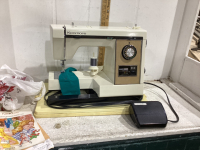 PORTABLE KENMORE SEWING MACHINE