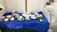 TEA CUPS AND SAUCERS