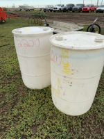 Two poly barrels with lids