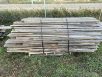 Bundle of used fence slabs