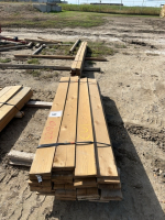 Bundle of treated 6 foot fence boards