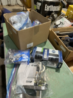 Box full of door, knobs, and entry systems