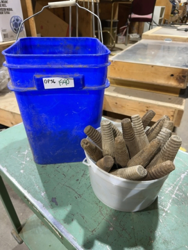 Bucket of insulator, post and half pail of staples