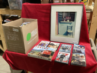 BOX OF DVD’S AND A FRAMED PICTURE