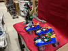 2 ITEMS- BOX W/3 MARIO CART RACE CAR DRIVERS AND ROBOT - 2