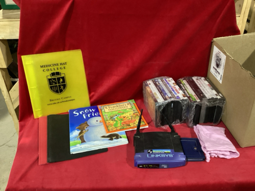 DVD’S , BINDER, KIDS BOOKS, ROUTER, TOYS, CAMERA BAGS,