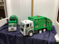 (2) TOY SANITATION TRUCKS - TONKA & SUPREME MACHINES