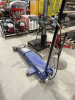 Westward hydraulic service jack