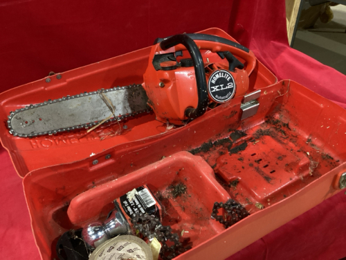 HOMELITE XL2 AUTOMATIC GAS CHAINSAW IN A CASE , TRAILER BALL,