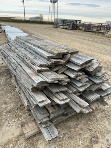 Bundle of weathered, slabs, and boards