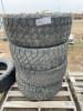 Stack of four truck tires