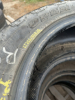 Stack of four truck tires - 3