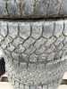 Stack of four truck tires - 4