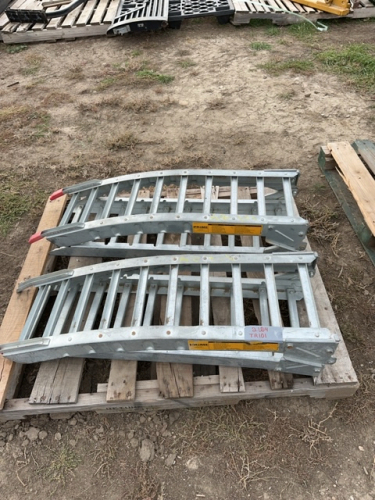 Two galvanized loading ramps