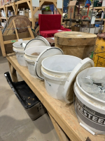 Four pails of bin parts