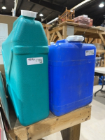 Two plastic water jugs