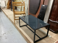 METAL & SMOKED GLASS COFFEE TABLE &. FOLDING WOOD CHAIR