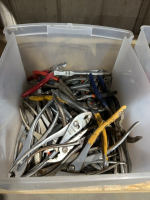 Tub of miscellaneous pliers