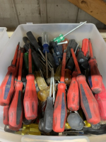 Tub full of miscellaneous screwdrivers