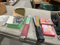 Box of staplers and staples