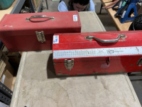 Two red steel toolboxes