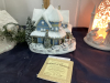 (2) BOXES W/ LIGHTED CHRISTMAS VILLAGE PIECES - INCLUDES A THOMAS KINCAID - 2