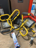 Three electric work lights