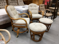 PAIR OF RATTAN CUSHIONED ROLLING CHAIRS W/ OTTOMANS